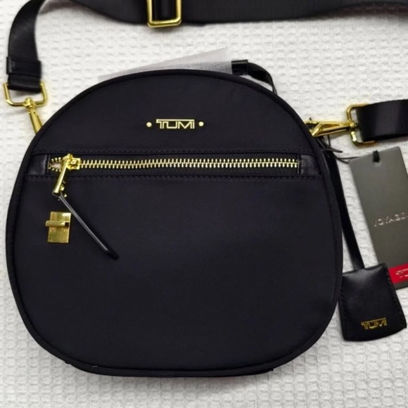 Tumi Handbags - ✨ TUMI Voyageur Small Crossbody Bag Black Gold Hardware Like New